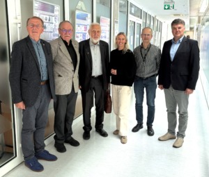 I&scaron; kairės: Prof. habil. dr. Algimantas Kri&scaron;čiukaitis, prof. habil. dr. Arūnas Luko&scaron;evičius, Prof. habil. dr. Audris Kopustinskas su paskaitų klausytojais
