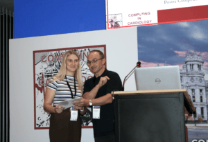 K. Eitminavičienė atsiima apdovanojimą konfedencijoje CinC2026